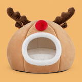 Christmas Reindeer Plush Pet Tent Bed — isolated product on a warm peach background