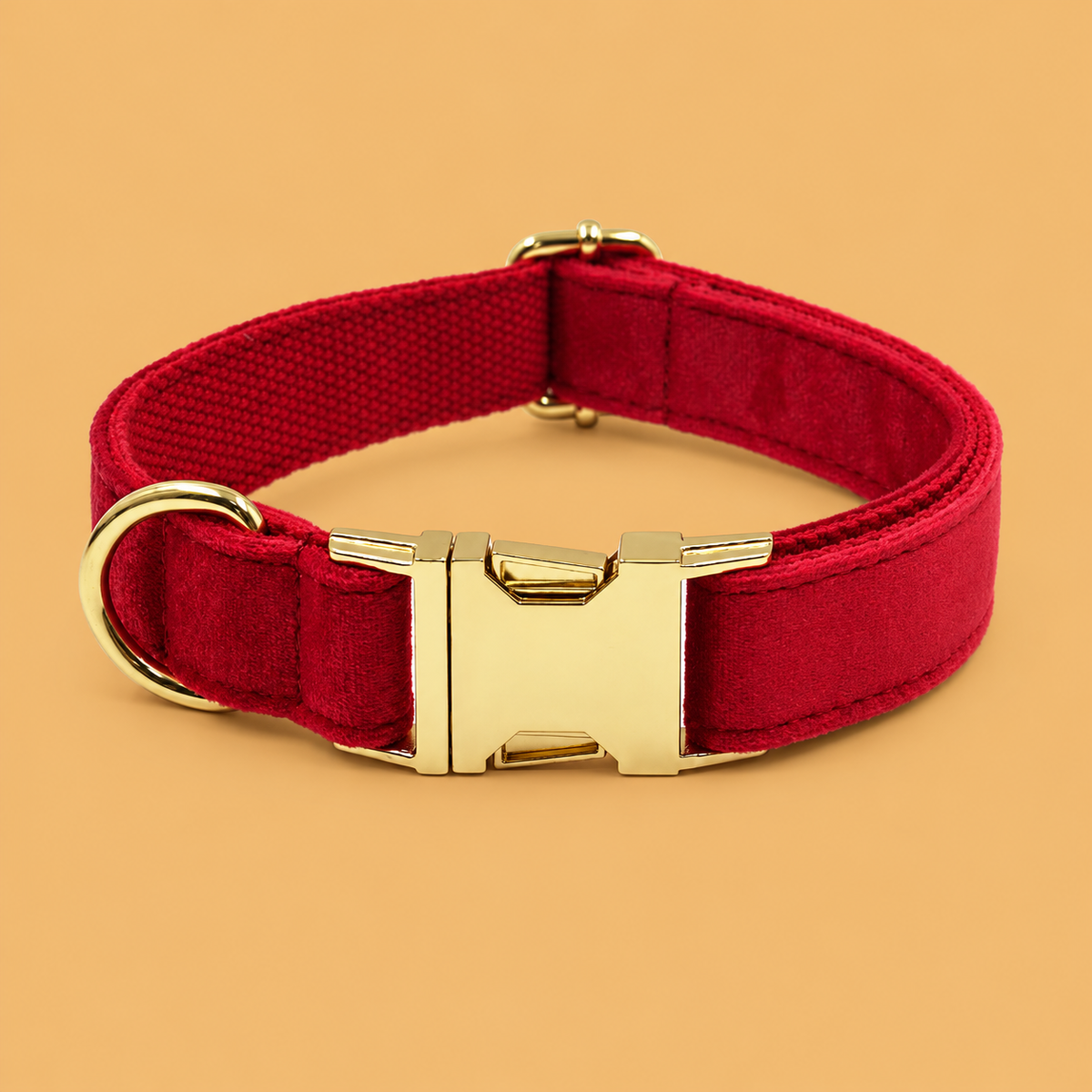 Christmas Red Velvet Dog Collar & Accessories — isolated product on a warm peach background