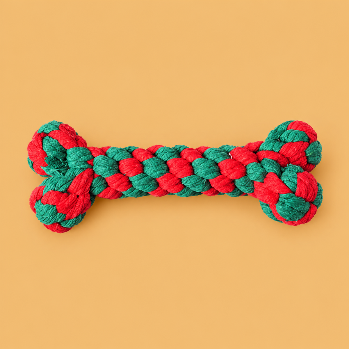 Christmas Cotton Rope Dog Toys – Festive Shapes — isolated product on a warm peach background