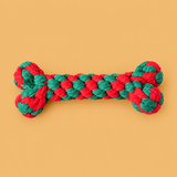 Christmas Cotton Rope Dog Toys – Festive Shapes — isolated product on a warm peach background
