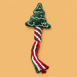 Christmas Character Dog Chew & Play Toy — isolated product on a warm peach background