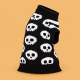 Halloween Skull Sweater for Dogs — product on peach background