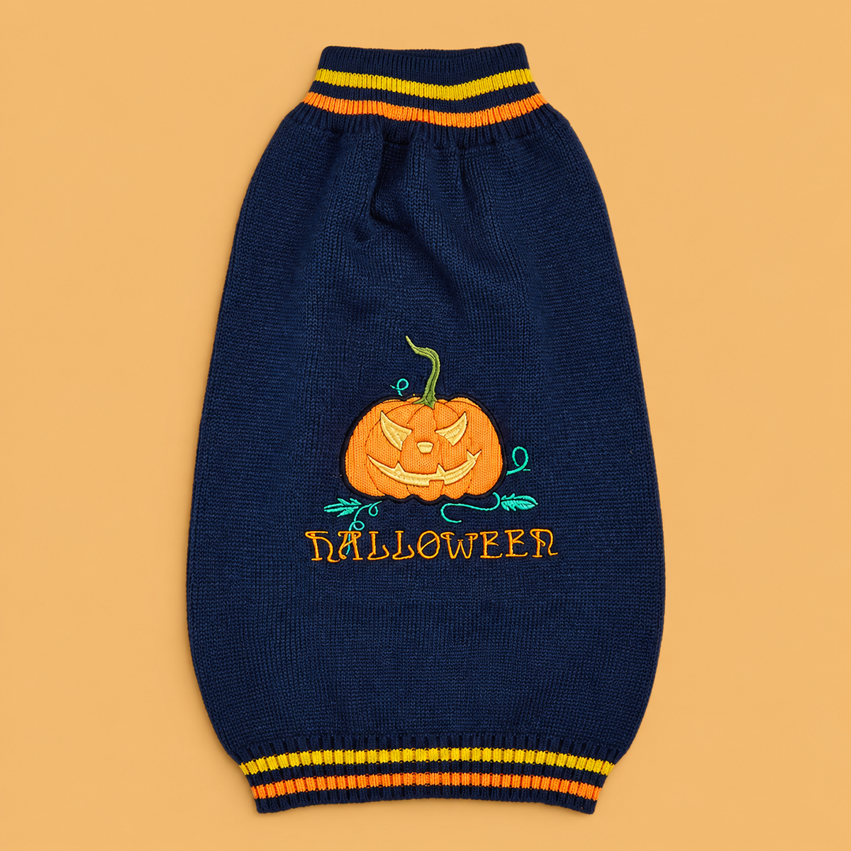 Blue Pumpkin Dog Sweater — product on peach background