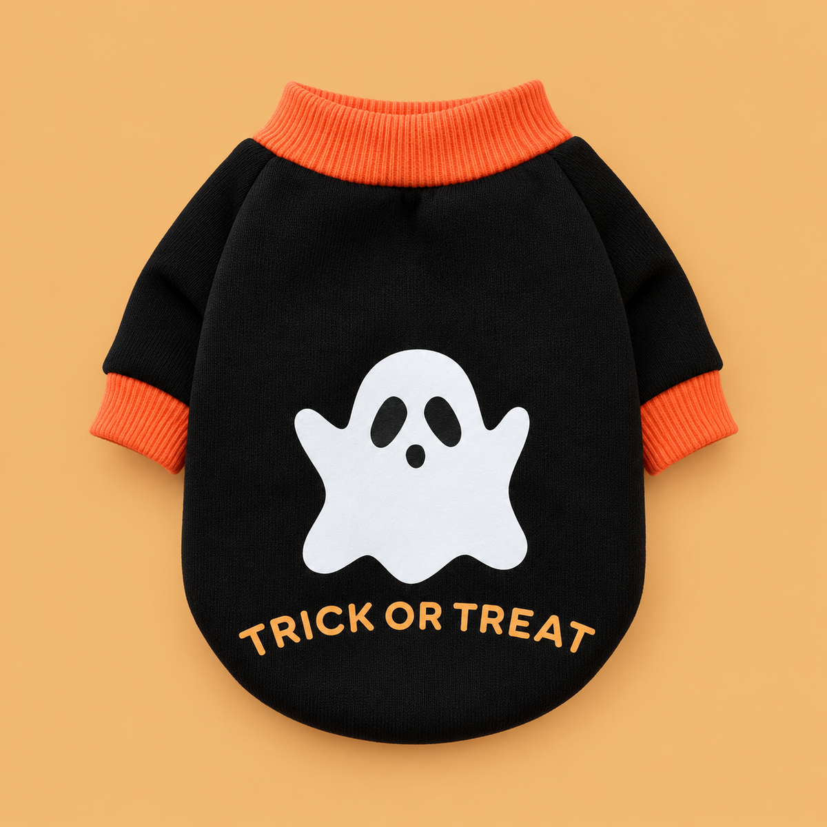 Pumpkin & Skull Dog Sweater — product on peach background
