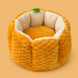 Plush Pumpkin Cat Nest — product on peach background