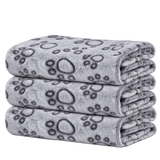Pawprint Fleece Blanket Trio — isolated product on a transparent background